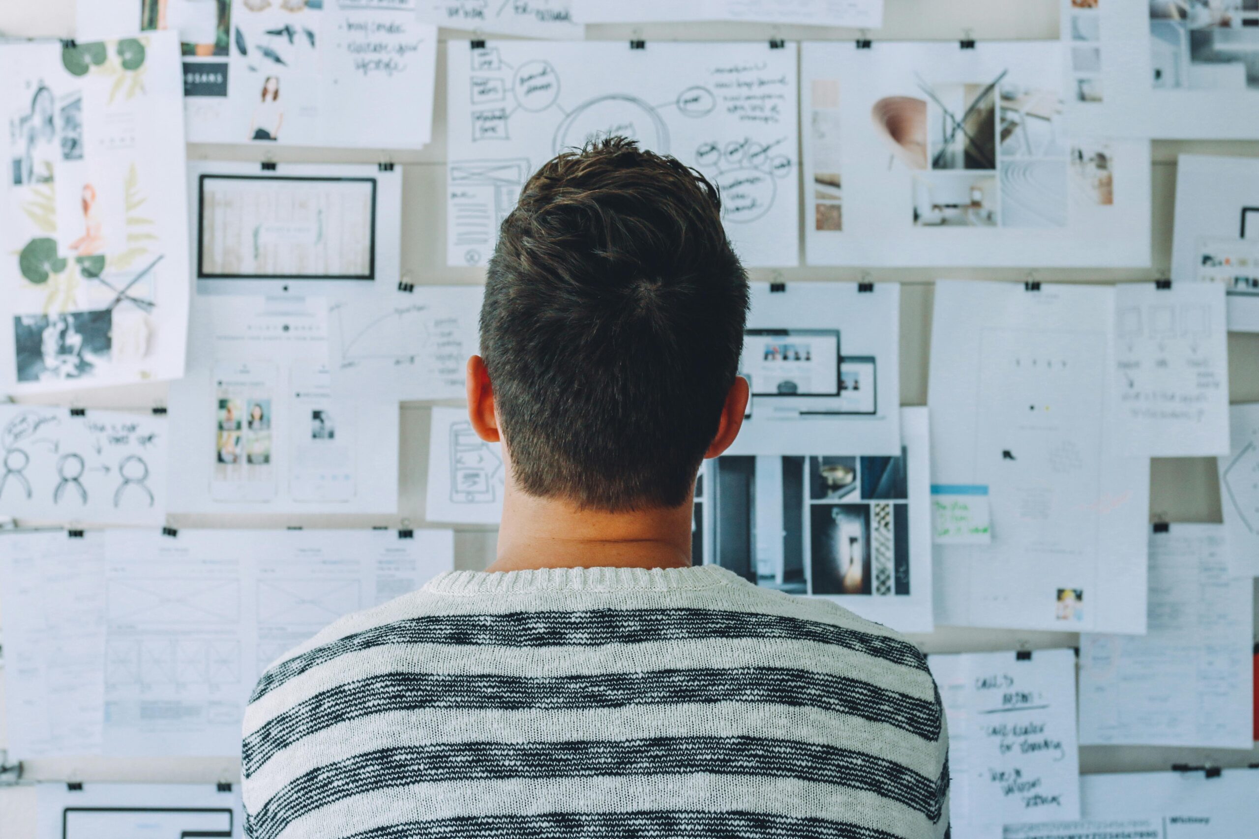 A man standing in front of a whiteboard.